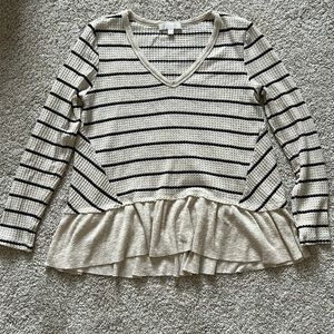 Cream and black striped peplum top